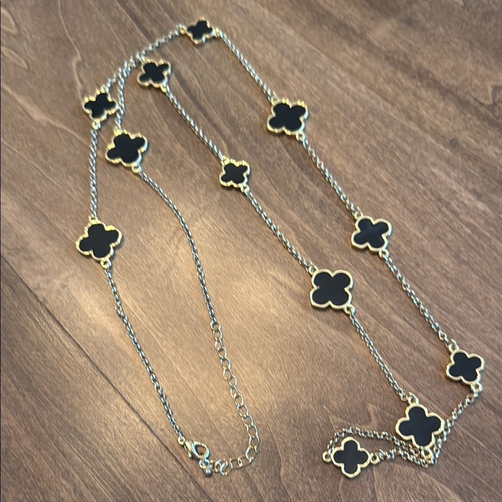 Elegant Black and Gold Clover Necklace